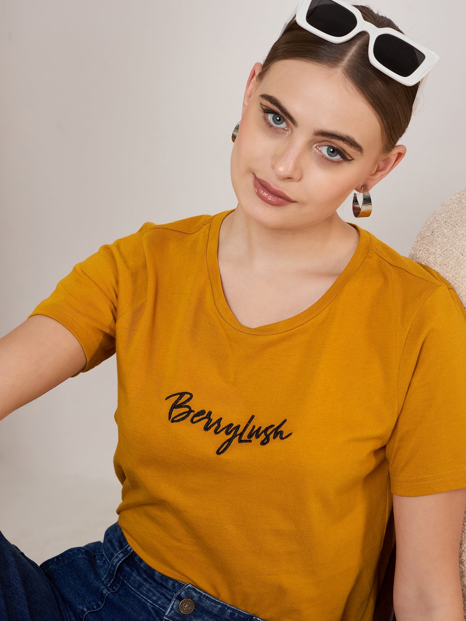 Berrylush Women Solid Mustard Yellow Round Neck Front Brand Logo Short Sleeves Knitted Regular T-Shirt