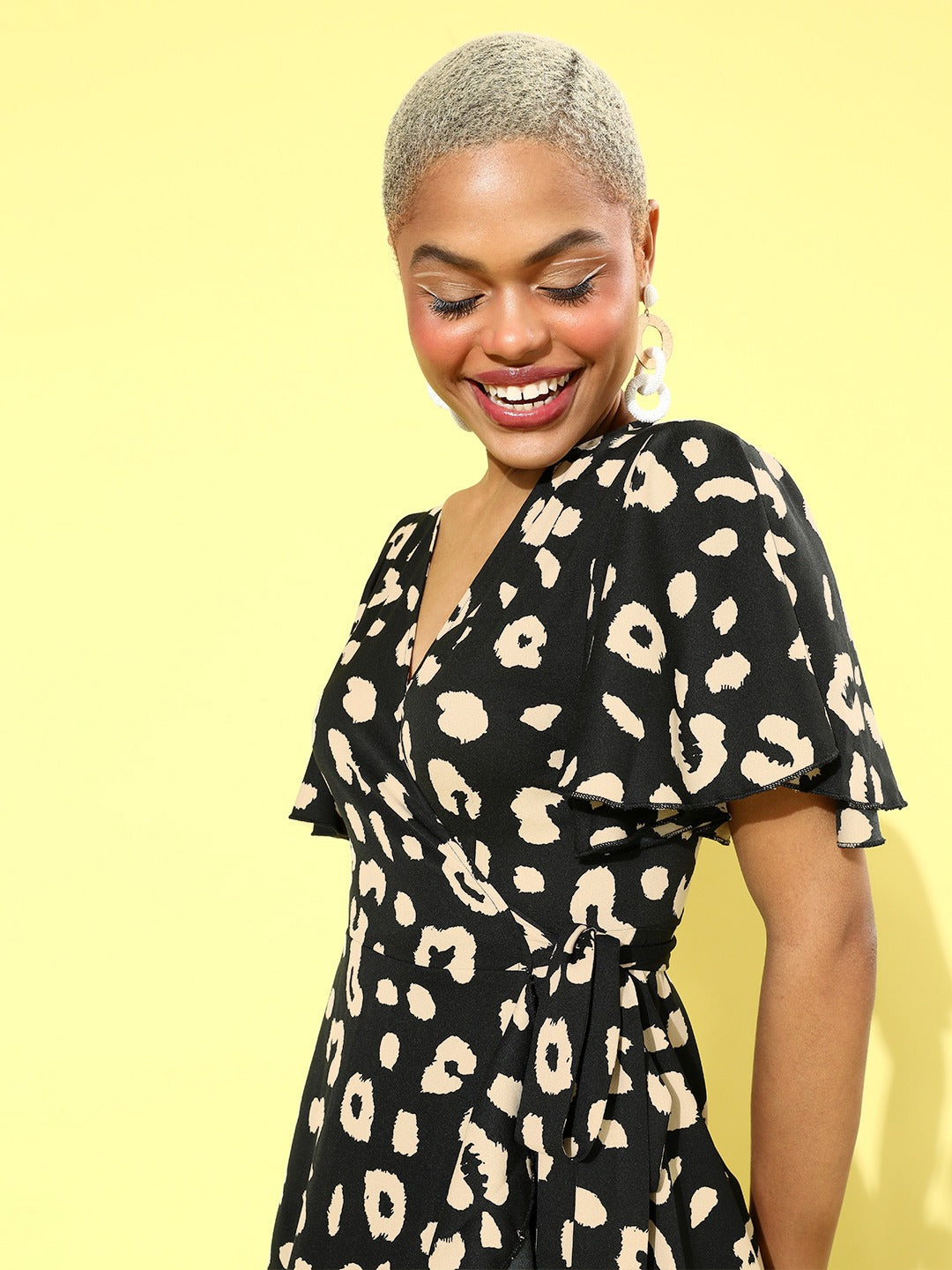 Black and 2025 yellow wrap dress