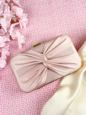 Pink bow clutch online bag